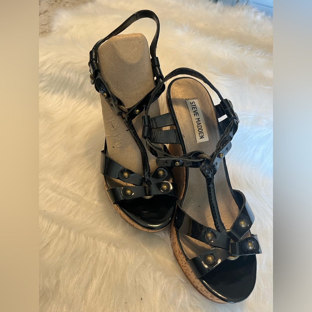 Black wedge heels . Worn twice.